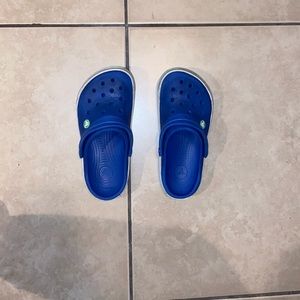 Blue and green crocs